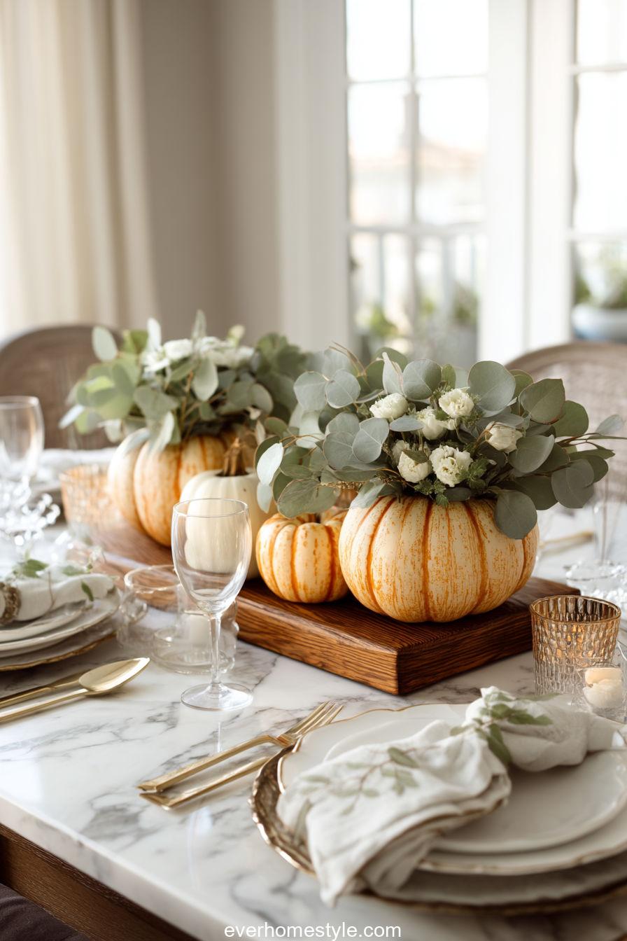 9. Elegant Pumpkin and Eucalyptus Arrangement